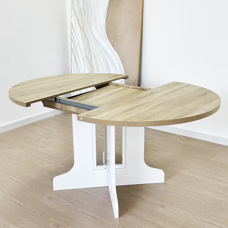 Table à manger ronde élégante de style ferme avec rallonge et piètement en X, idéale pour une salle à manger moderne