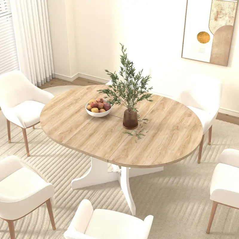 Table à manger ronde élégante de style ferme avec rallonge et piètement en X, idéale pour une salle à manger moderne