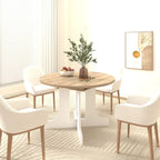 Table à manger ronde élégante de style ferme avec rallonge et piètement en X, idéale pour une salle à manger moderne