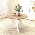 Table à manger ronde élégante de style ferme avec rallonge et piètement en X, idéale pour une salle à manger moderne