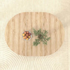 Table à manger ronde élégante de style ferme avec rallonge et piètement en X, idéale pour une salle à manger moderne
