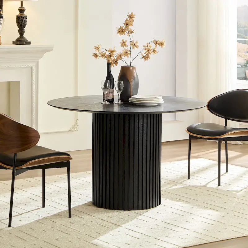 Table à manger ronde élégante de style ferme avec rallonge et piètement en X, idéale pour une salle à manger moderne