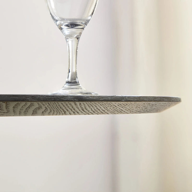 Table à manger ronde élégante de style ferme avec rallonge et piètement en X, idéale pour une salle à manger moderne
