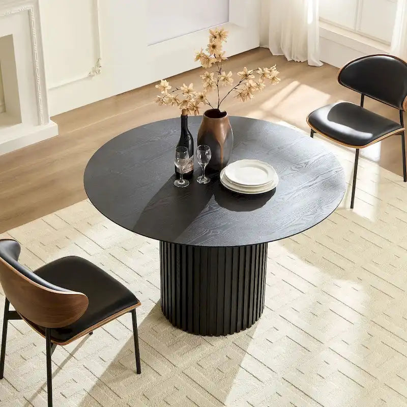 Table à manger ronde élégante de style ferme avec rallonge et piètement en X, idéale pour une salle à manger moderne