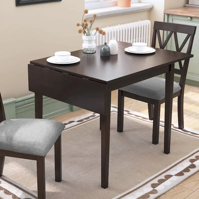Table à manger ronde élégante de style ferme avec rallonge et piètement en X, idéale pour une salle à manger moderne