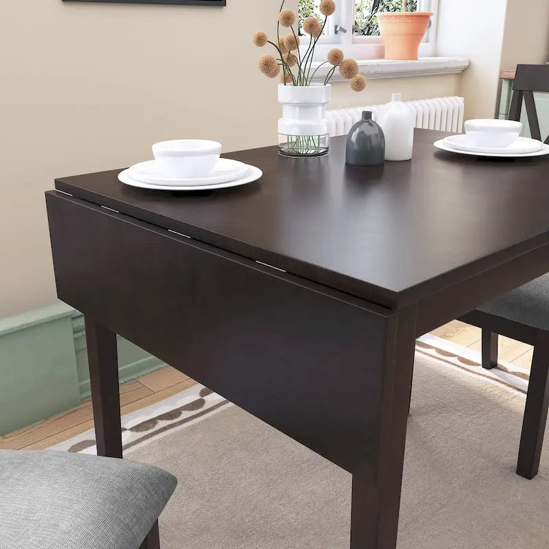 Table à manger ronde élégante de style ferme avec rallonge et piètement en X, idéale pour une salle à manger moderne